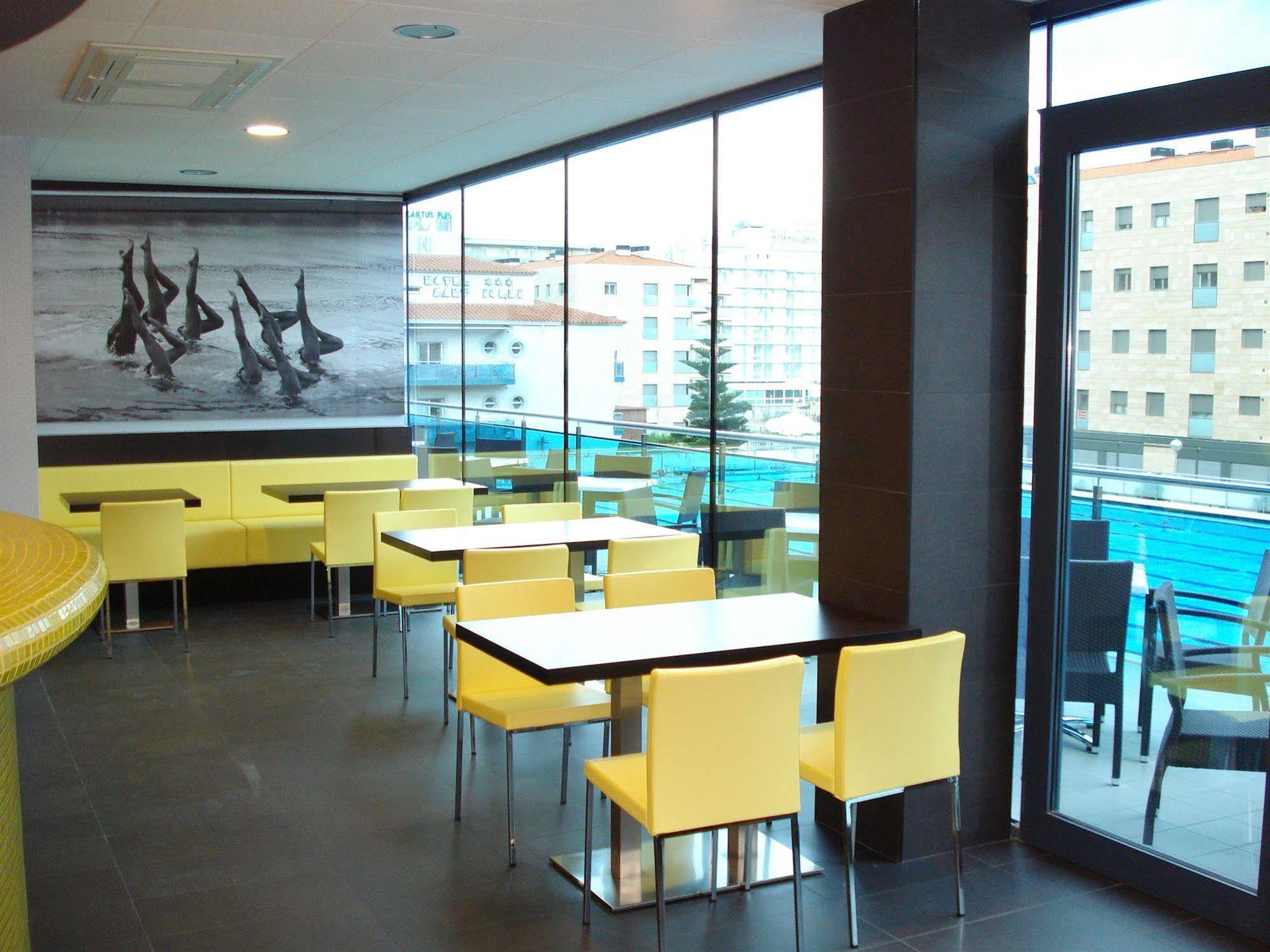 Sant Jordi Boutique Hotel Calella Exteriör bild Interior of a McDonald's restaurant in Prague, Czech Republic