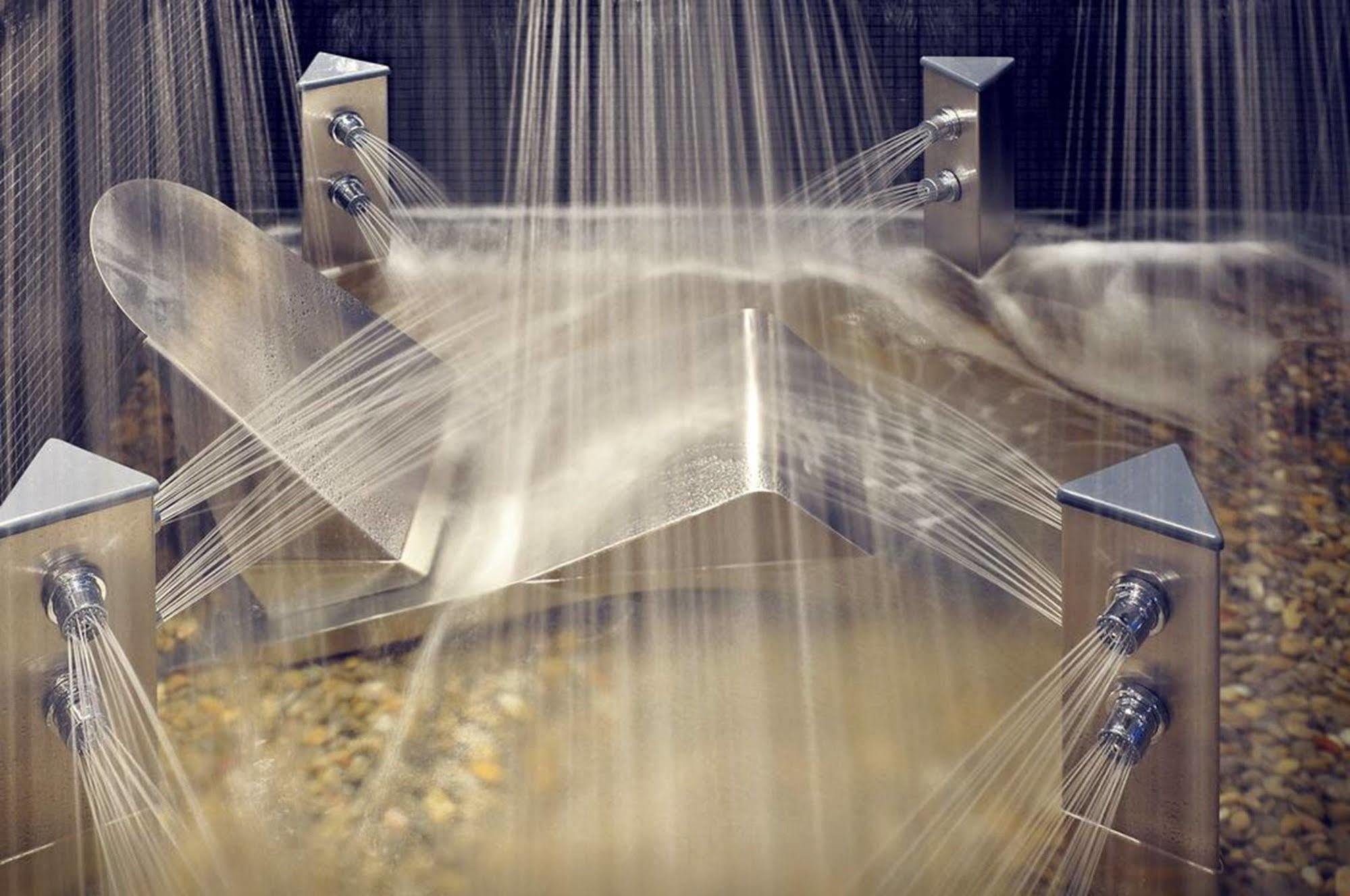 Sant Jordi Boutique Hotel Calella Exteriör bild Spraying water on the surface of a rotating drum